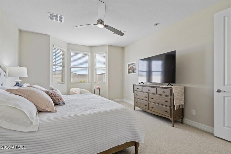 Primary Bedroom with a sitting area