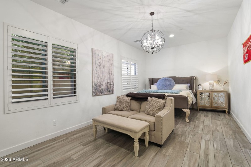 Spacious Bedroom w Shutters & Chandelier