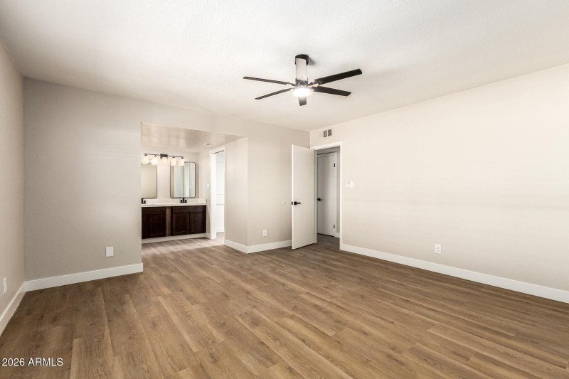 Primary Bedroom Looking to Bathroom