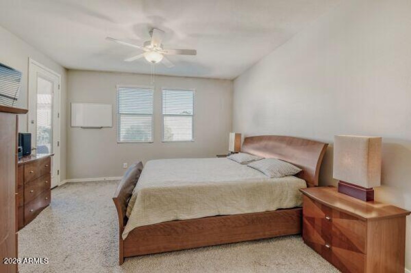 Spacious primary suite with patio access