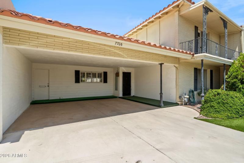 DESIRABLE TWO CAR CARPORT