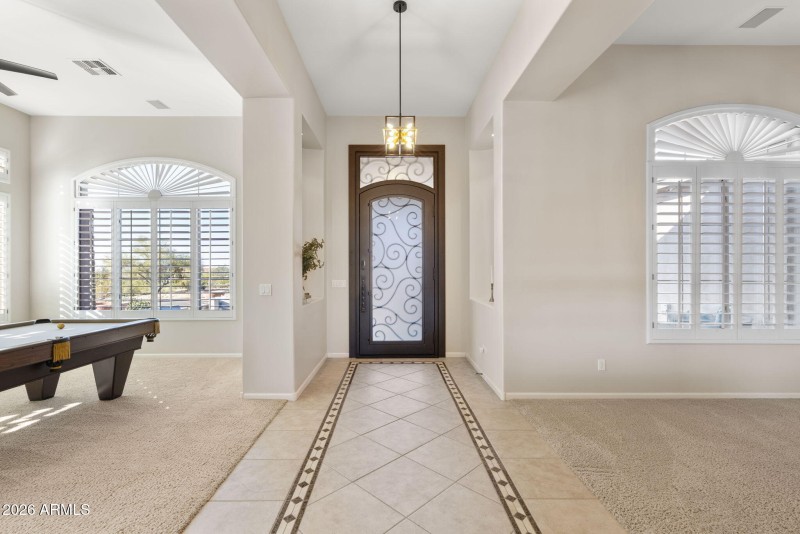 Grand Entry with Custom Iron Door