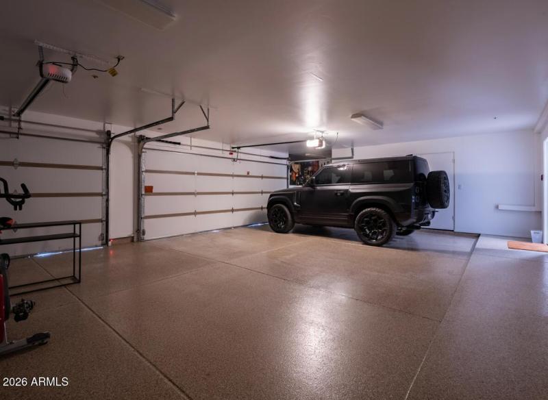 Spacious 3 car garage with workshop