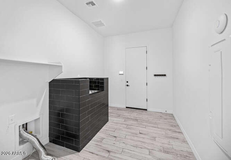 Laundry with Doggie Wash Station