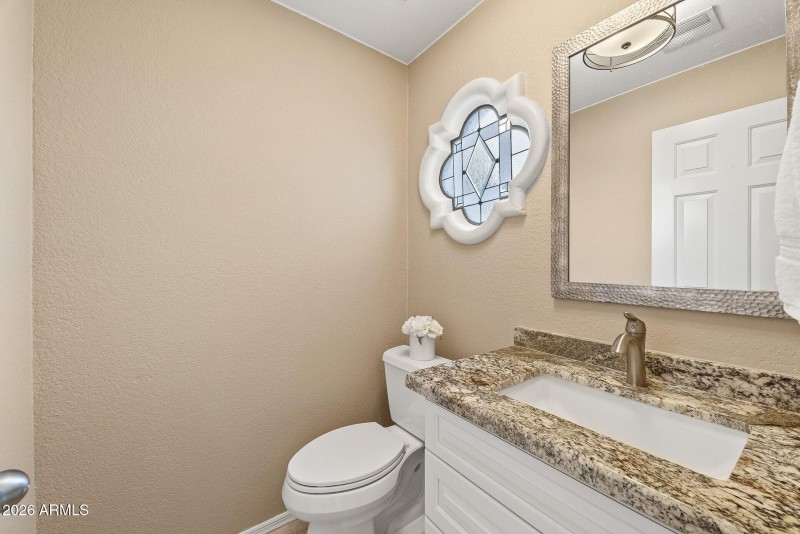 Downstairs Half Bath off Entry