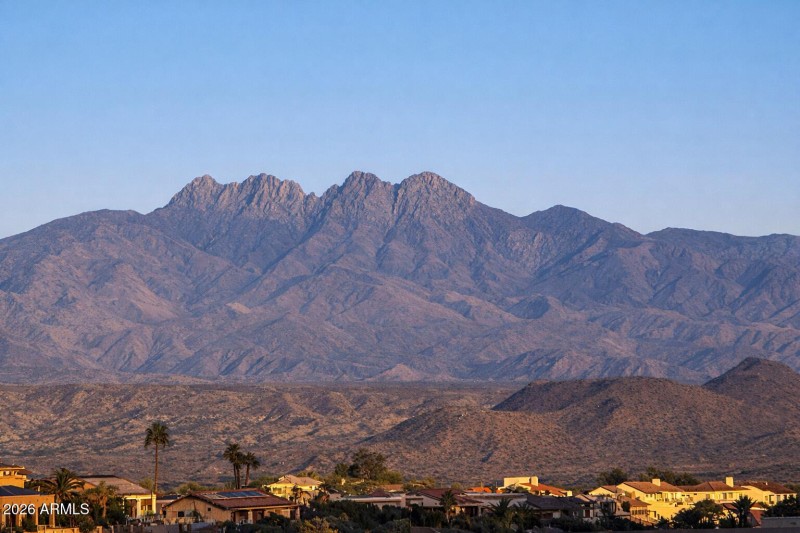 Four Peaks over desert homes
