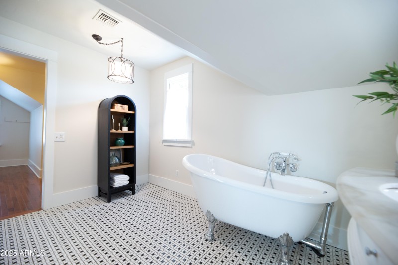 33 Primary Bathroom and Walk-in Closet