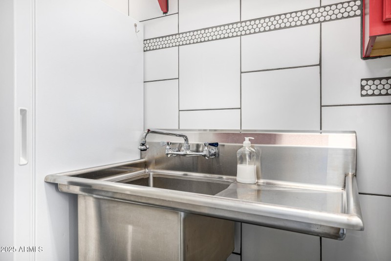 Laundry sink 14523 E Charter Oak Dr