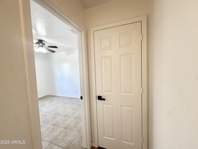 CLOSET AT END OF HALLWAY