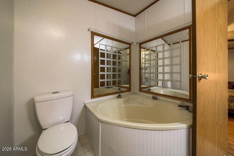 22 - Primary Bath w Soaking Tub and Show
