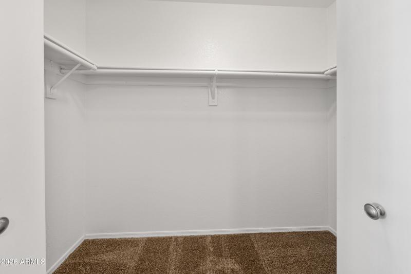 25 - Master walk in closet
