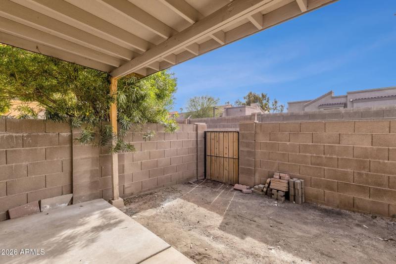 Large partially gravel backyard
