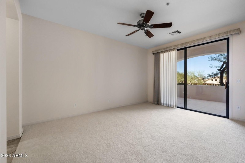 Spacious master with tiled patio