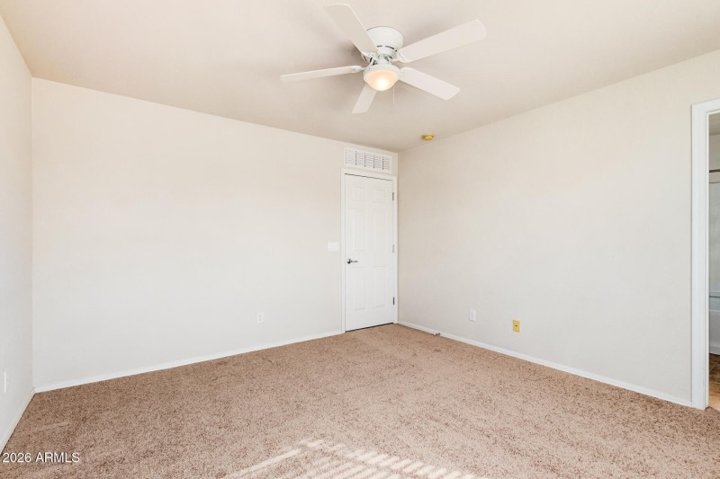 Primary Bedroom Has A Ceiling Fan