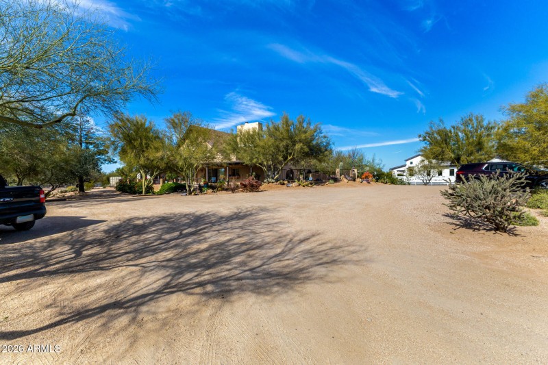 Expansive Acreage & Driveway