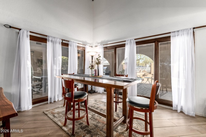 Sunlit Dining with Patio Views
