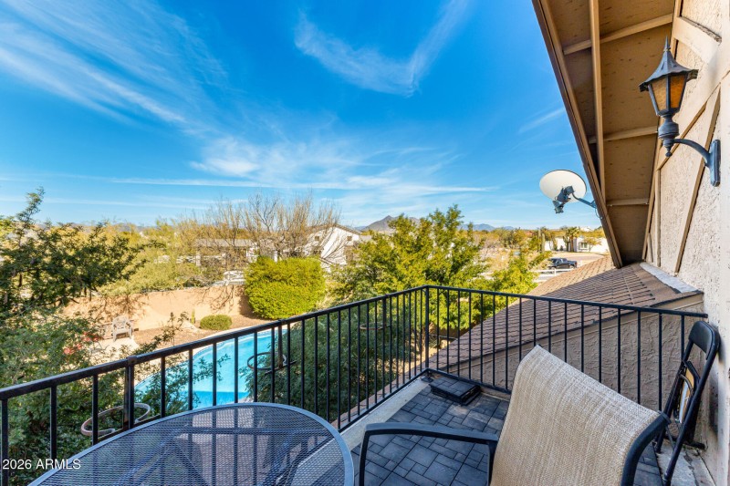 Balcony View Over Pool Oasis