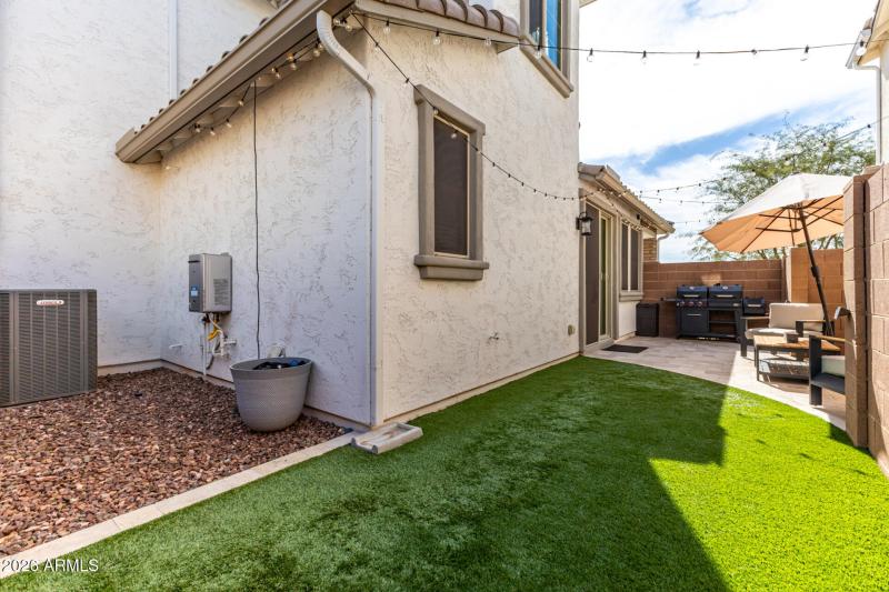 Turf + Travertine + Gravel + Space