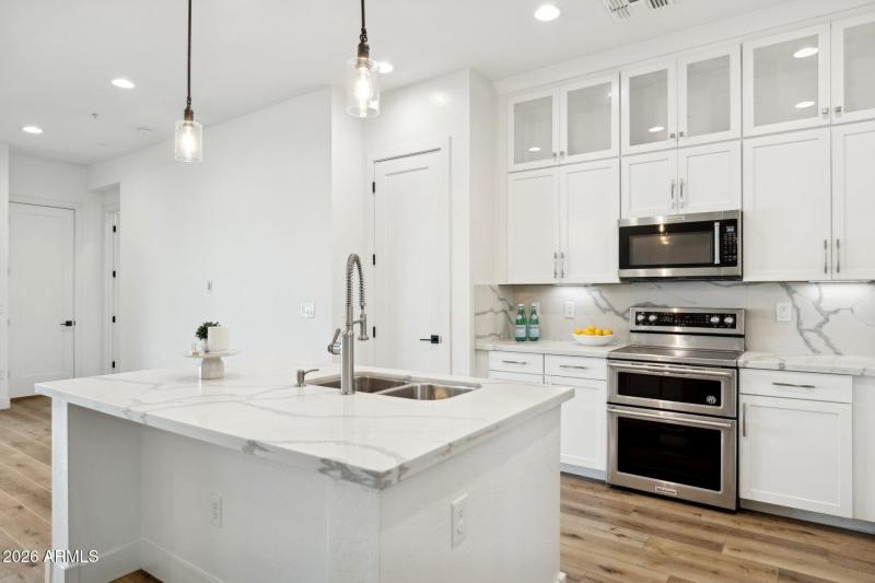 Kitchen with upper glass cabinets