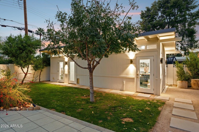 Detached offices and garage at dusk