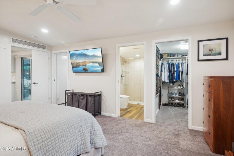 Primary walk-in closet and bath
