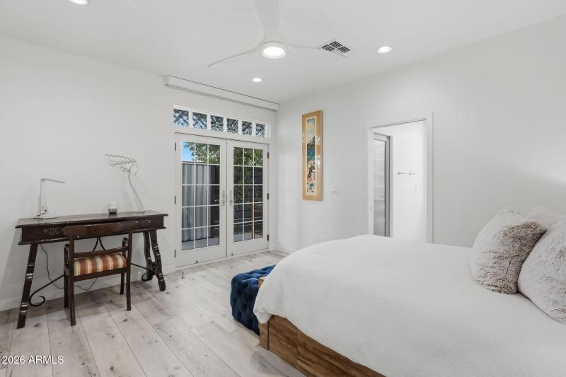 Guest Room w/ French Doors to Courtyard