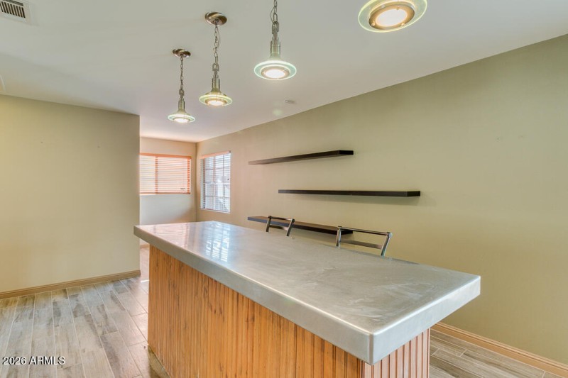 7. KITCHEN DINING AREA WITH CUSTOM LIGHT