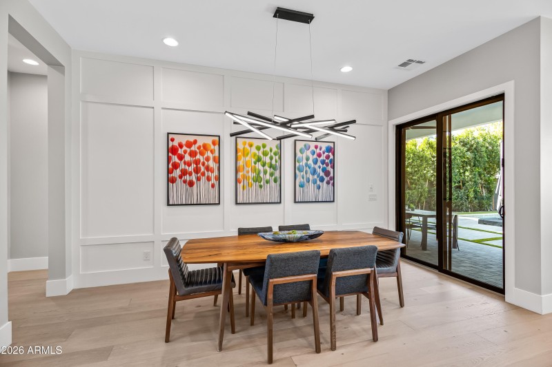 Dining Room boasts designer chandelier