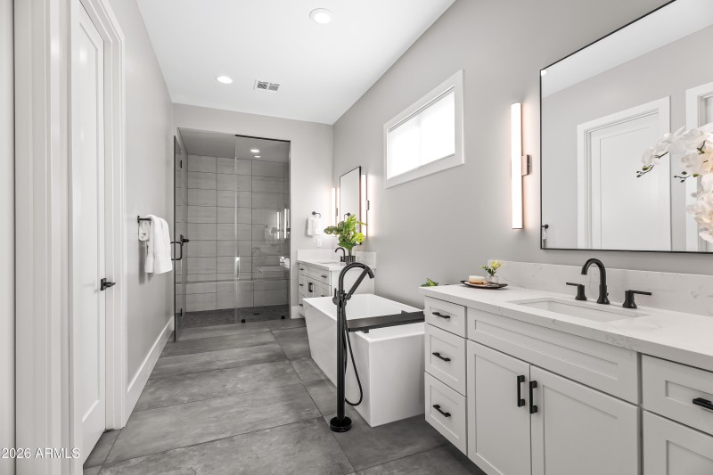 Primary Bath boasts dual vanities