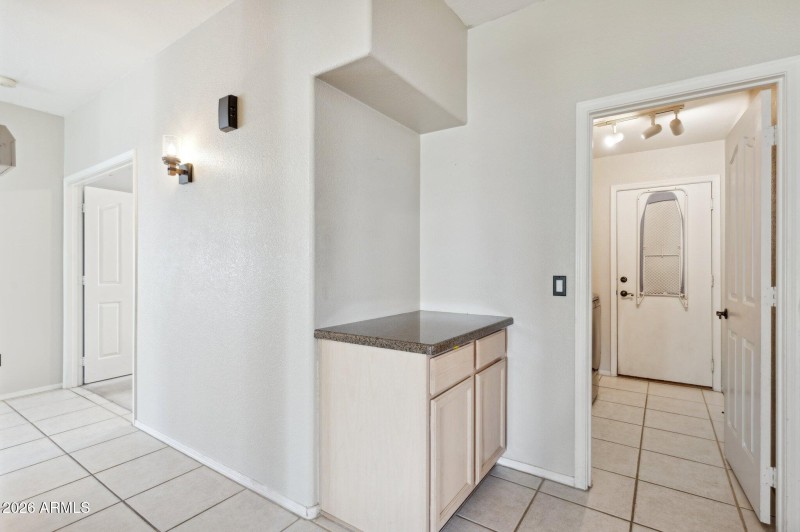 Hall to laundry room view