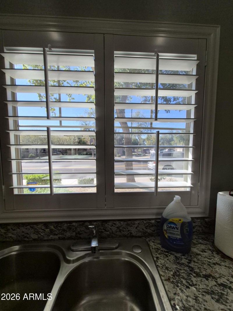 Plantation shutters over sink