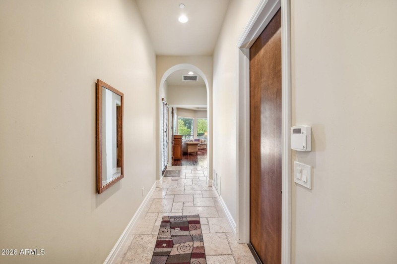 Hall to Garage + Laundry + Master Suite