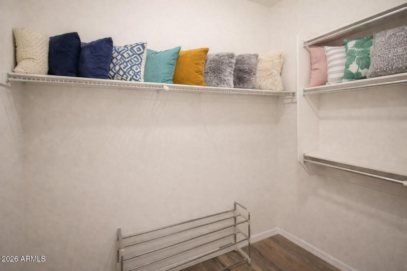 Neatly arranged decorative pillows in cl