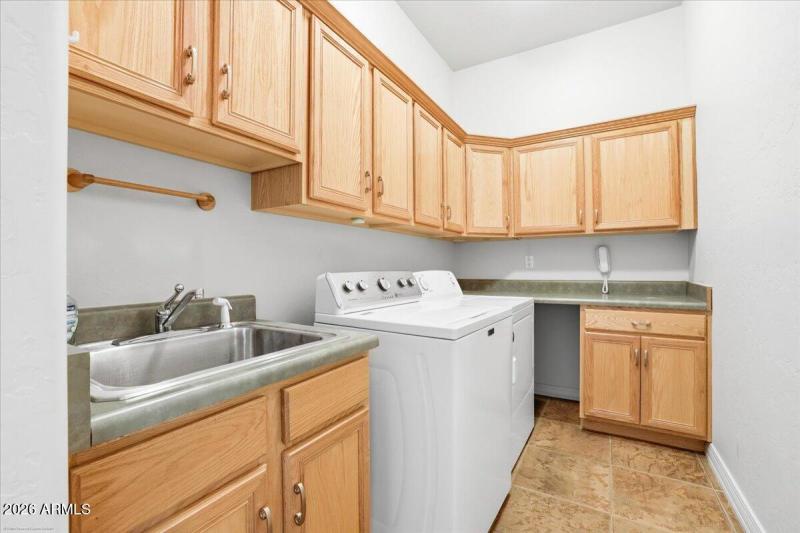LAUNDRY ROOM BETWEEN GUEST BEDROOMS