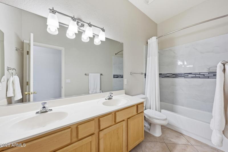 Guest Bathroom with tile bath
