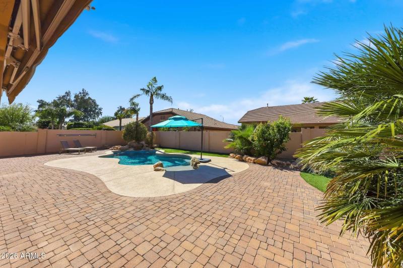 Pool with cool decking and pavers