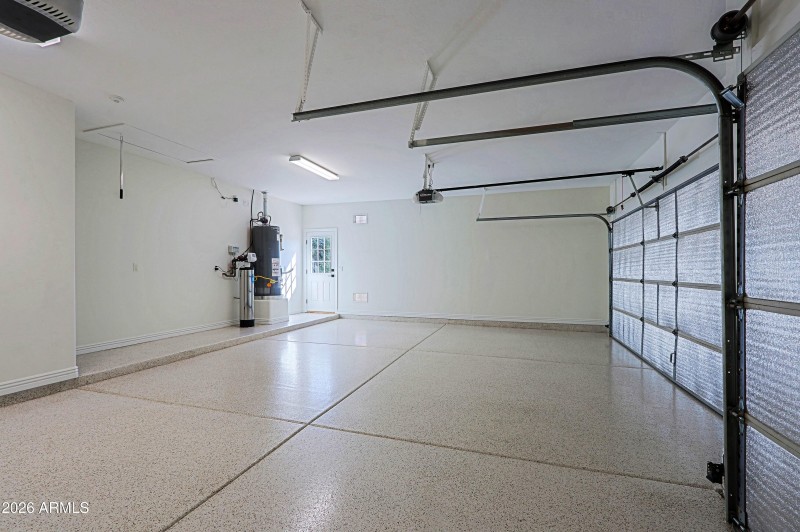 3 car garage with epoxy flooring