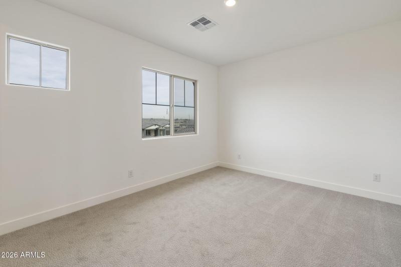 BEDROOM WITH WALK IN CLOSET