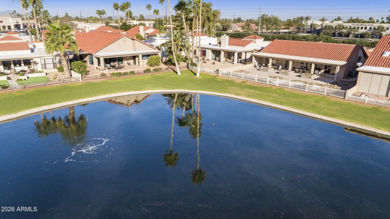 Aerial back view - home on lake