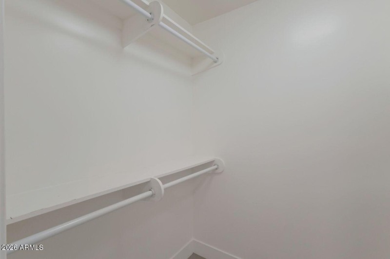 Primary walk-in closet.