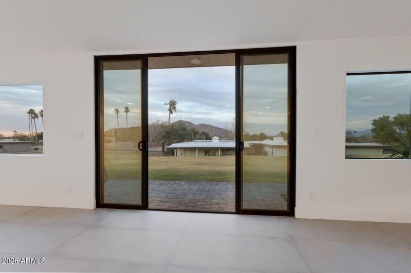 Custom glass door system to patio.