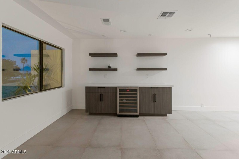 Built-in bar & beverage center.