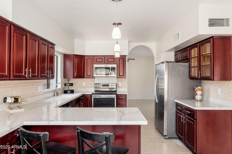 9596 E Windrose Dr - 10