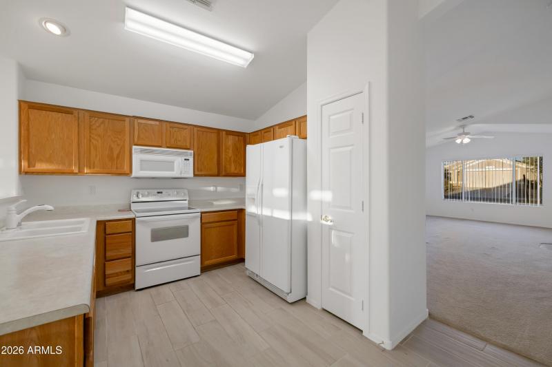 Kitchen with white appliances