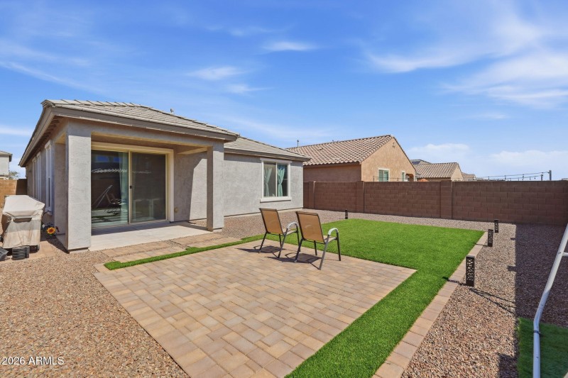 Paver sitting area with new turf