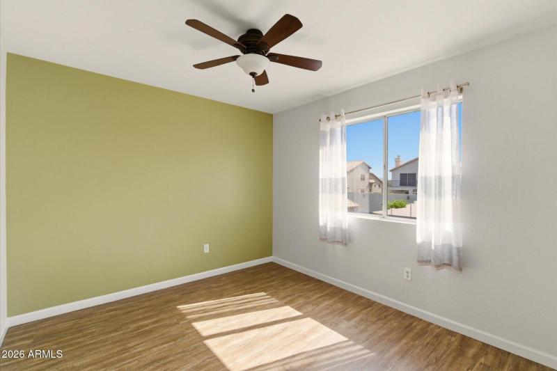 Bedroom 2 overlooks backyard