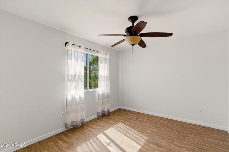 Bedroom 3 overlooks backyard