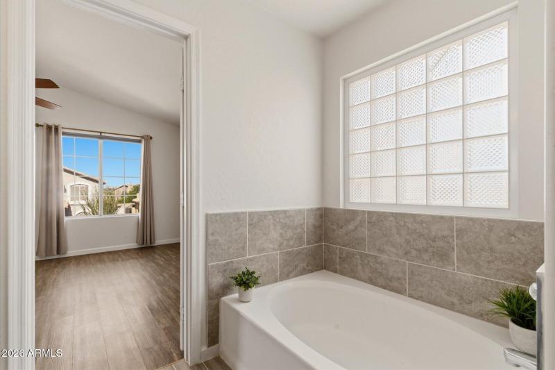 Relaxing bathtub with natural light