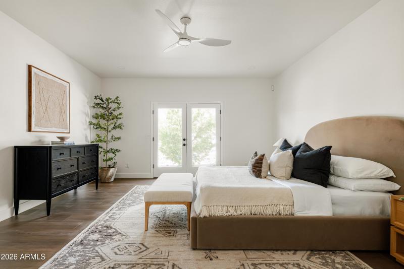 Primary bedroom with backyard access