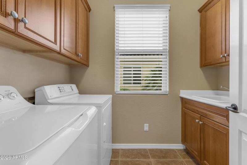 Laundry Room w/Sink & Cabinets